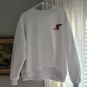 White Sweatshirt with Red Heart Logo